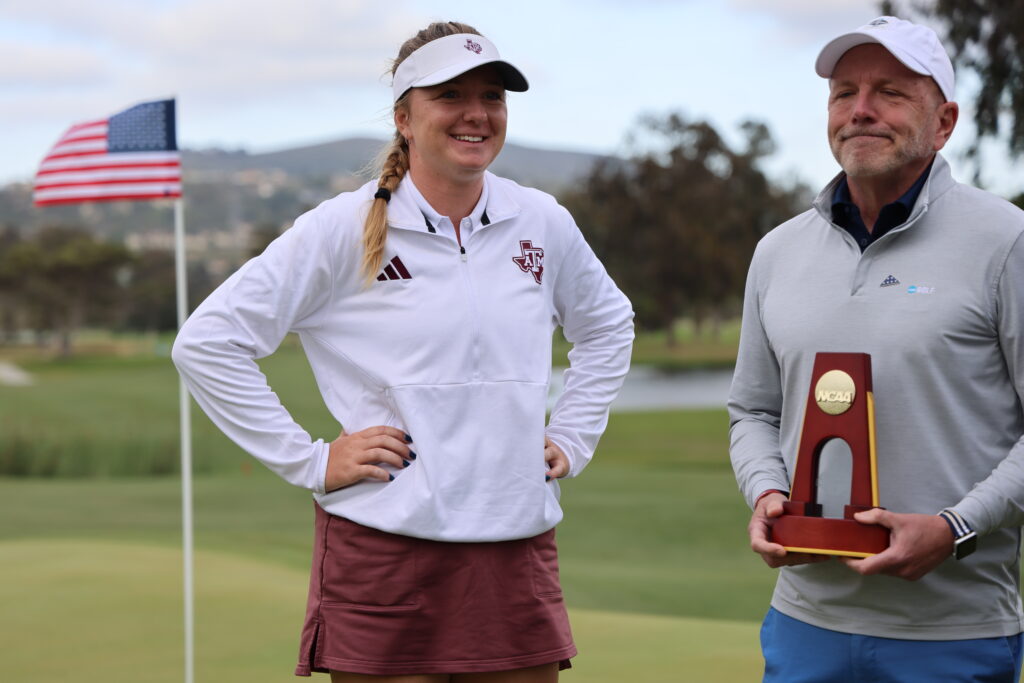 Adela Cernousek is all smiles as she's presented the 2024 NCAA Championship trophy.