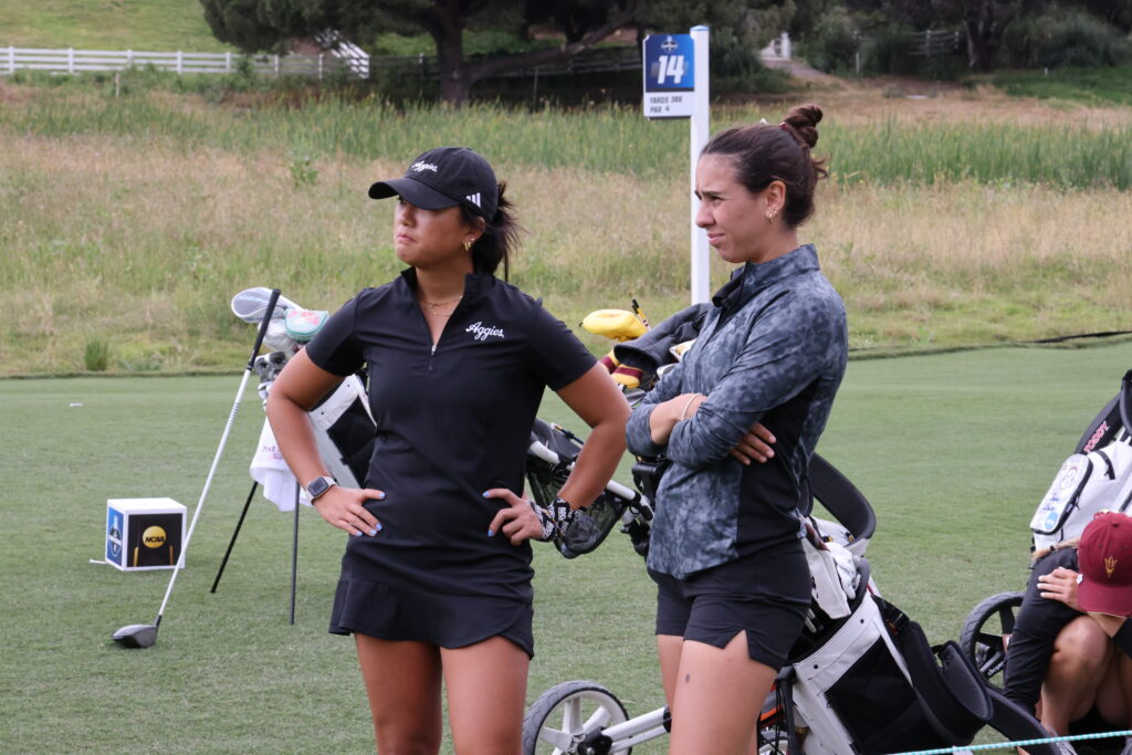 Cayetana Fernandez Garcia-Poggio of Texas A&M chats with her teammate at the 2024 NCAA DI Women's Golf Championship.