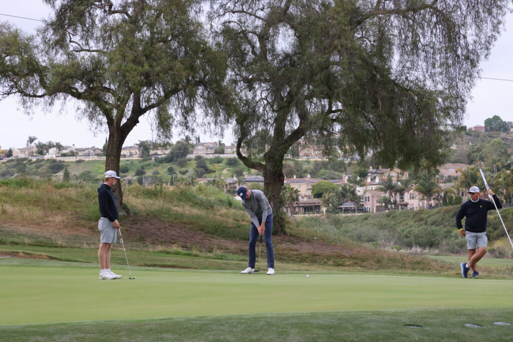 Christo Lamprecht putts for birdie during Round 1 of the NCAA DI Men's Golf Championship.