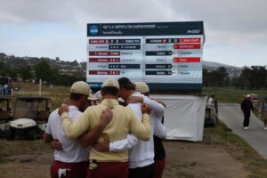 Florida State gathers in front of the scoreboard for a sweet moment.