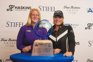 Ingrid Lindblad and Annika Sorenstam pose with the ANNIKA Award at Omni La Costa.