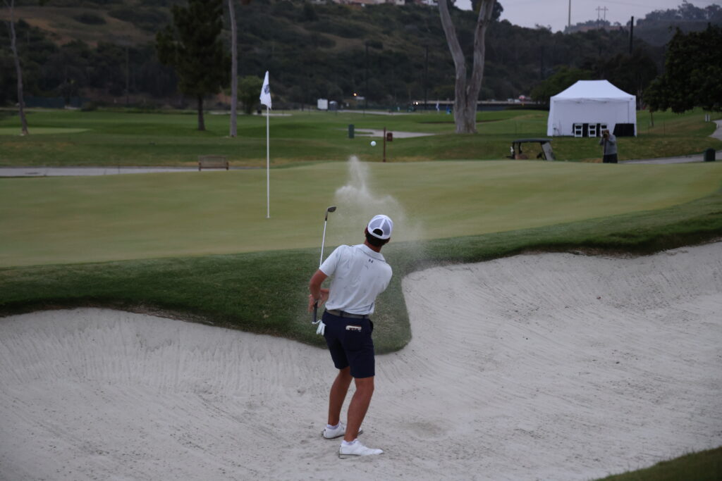 Jackson Koivun's sand shot to set him up for birdie and the ultimate win.