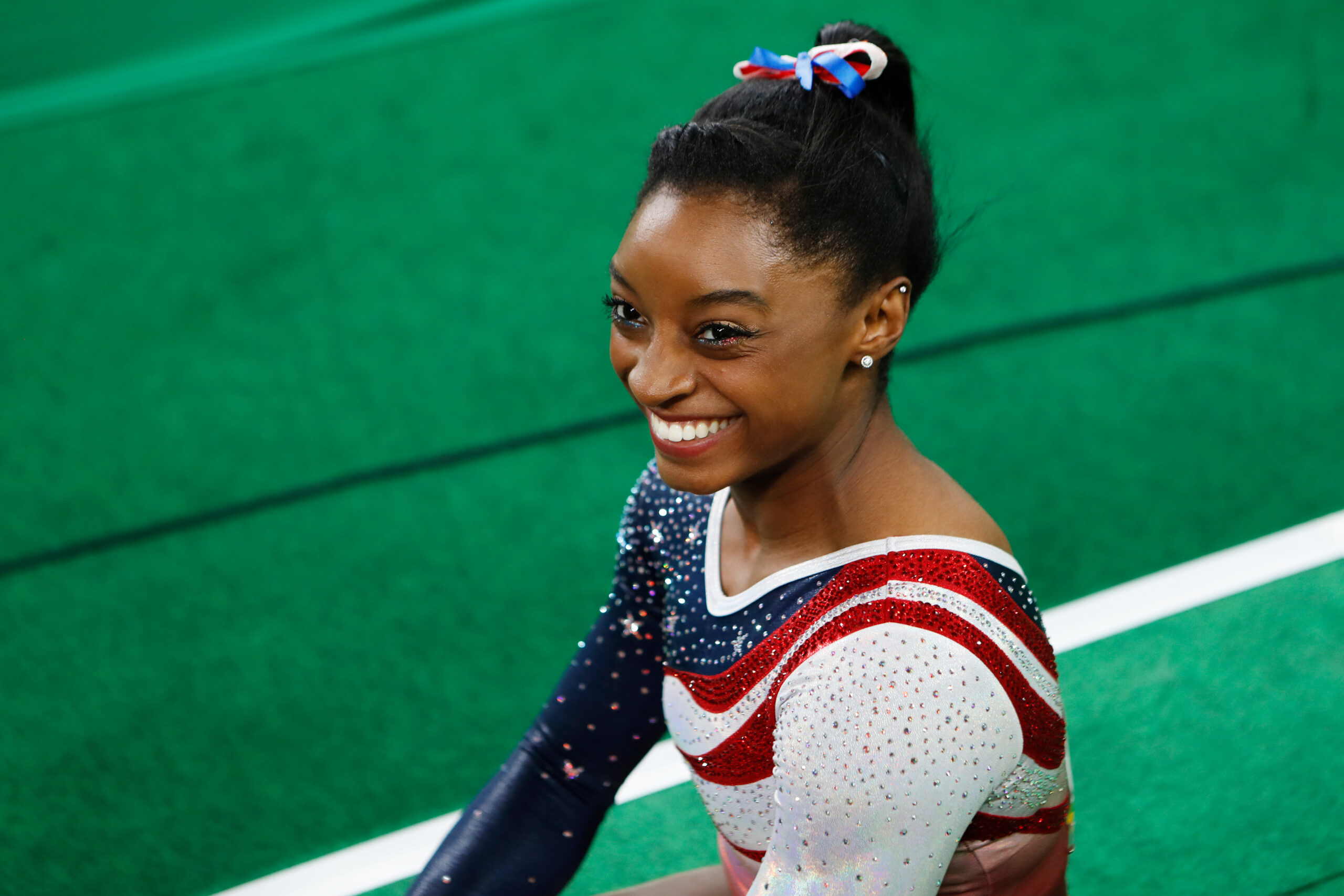 Simone Biles smiles at the 2016 Rio Olympics.