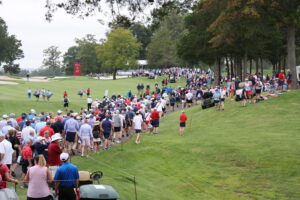 Golf fans streaming through Robert Trent Jones Golf Club.