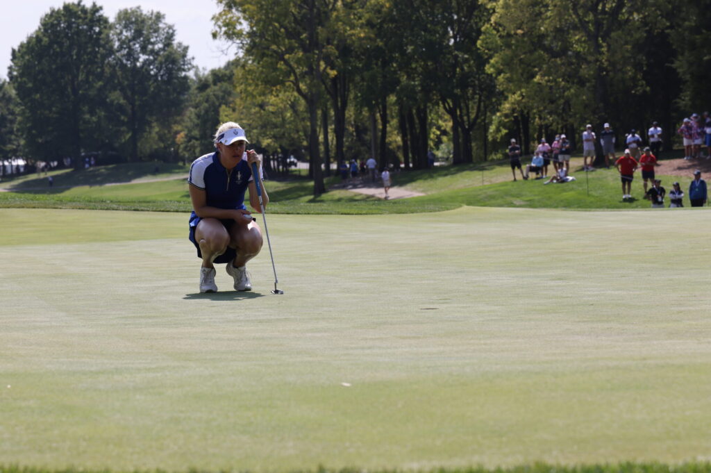 Charley Hull sizes up a putt on Hole #5.