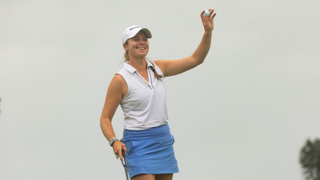 Mimi Rhodes waves to the crowd as she finishes up her last round at the Ford Women's NSW Open.