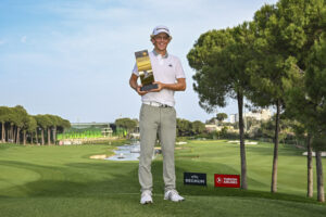 Martin Couvra of France poses for a photo with the trophy following his victory of the Turkish Airlines Open 2025 at Regnum Carya Golf & Spa Resort,