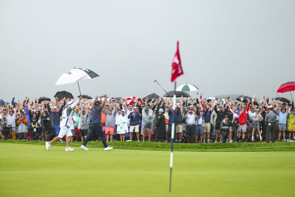 J.J. Spaun reacts after sinking his putt on the 18th hole to win the final round of the 2025 U.S. Open.