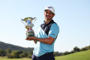 Adrien Saddier of France poses with the trophy after winning the 2025 Italian Open.