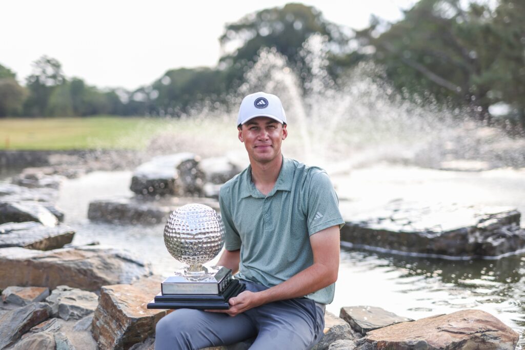 Samuel Simpson poses with the trophy.