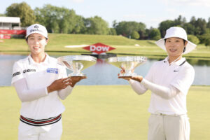 Jin Hee Im and Somi Lee of South Korea pose with their trophies after the final round of the Dow Championship 2025 at Midland Country Club.