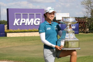 Minjee Lee poses with the trophy after winning the KPMG Women's PGA Championship at Fields Ranch East.