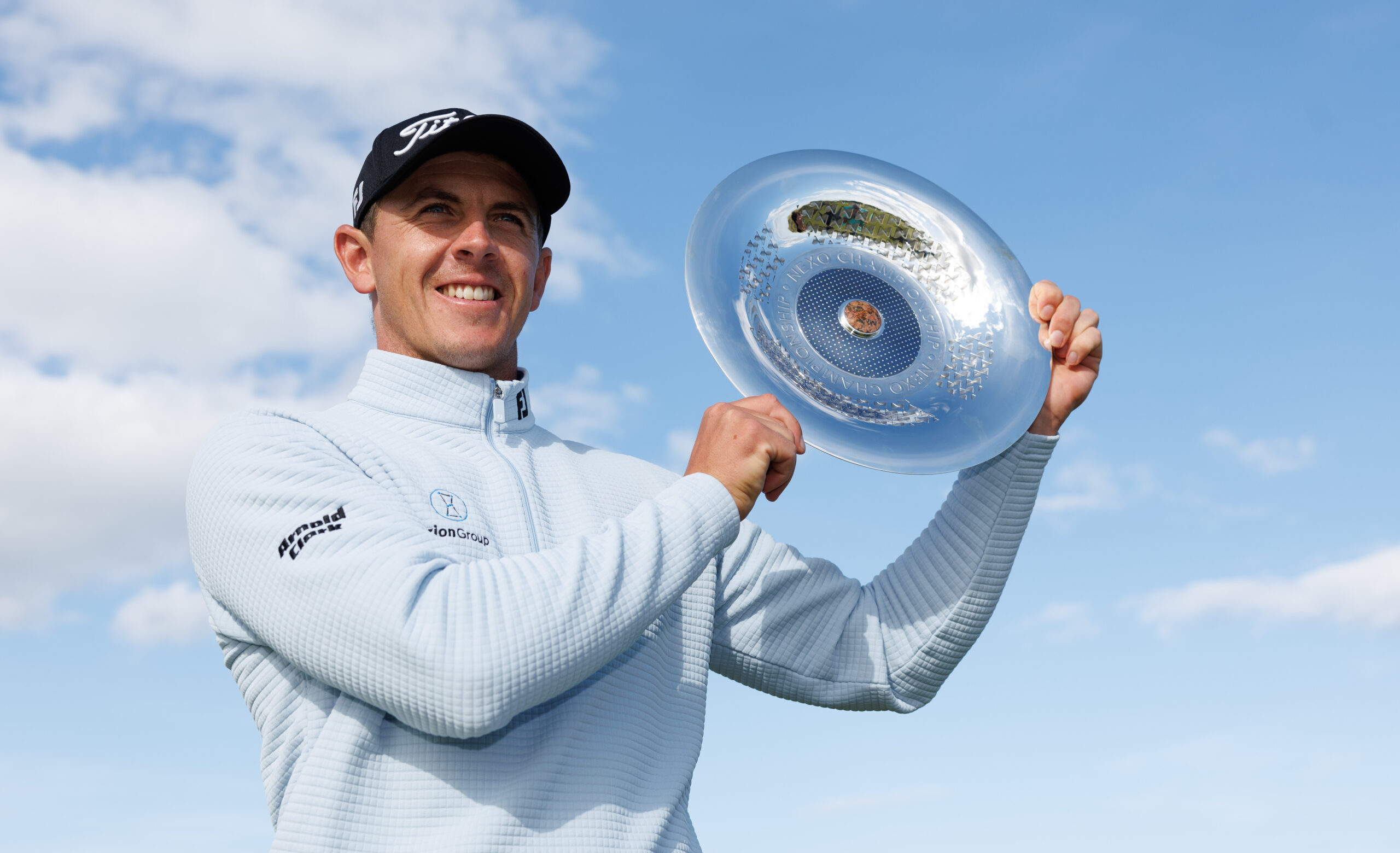 Scotland's Grant Forrest poses for a photograph with Nexo Championship 2025 trophy following the final round in Balmedie, Scotland.