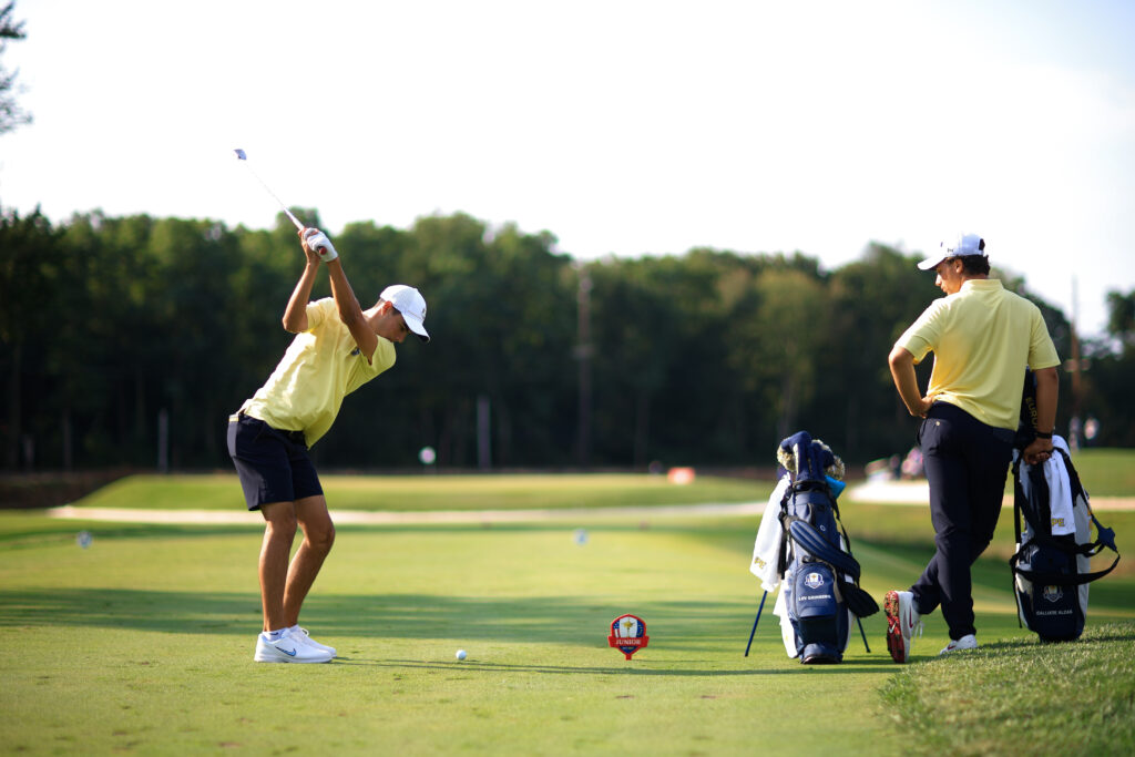 Lev Grinberg of Team Europe hits his tee shot on the fifth hole during the first round of the 2025 Junior Ryder Cup.