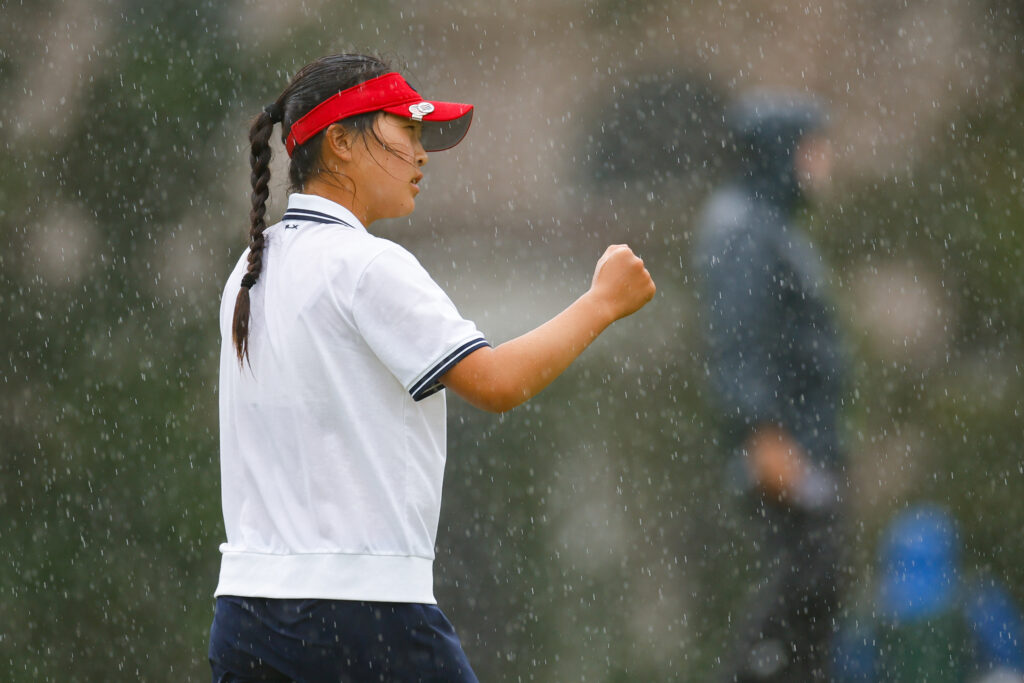 Anna Fang of Team United States reacts after putting on the 15th hole.