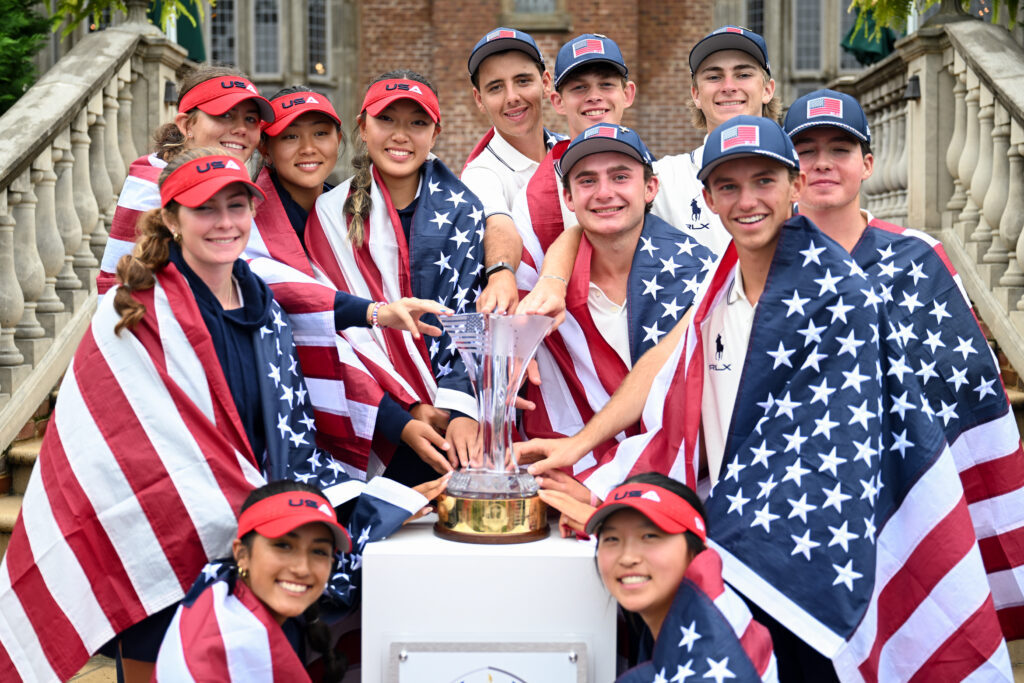 (L-R Back Row) Asterisk Talley, Rayee Feng, Lily Peng, Giuseppe Puebla, Hamilton Coleman, Lunden Esterline, (L-R Middle Row) Zoe Cusack, Tyler Mawhinney, Miles Russell, Luke Colton, (L-R Front Row) Amelie Zalsman, and Anna Fang of Team United States stand for a photo with the 2025 Junior Ryder Cup Trophy at the Closing Ceremonies during the 2025 Junior Ryder Cup.