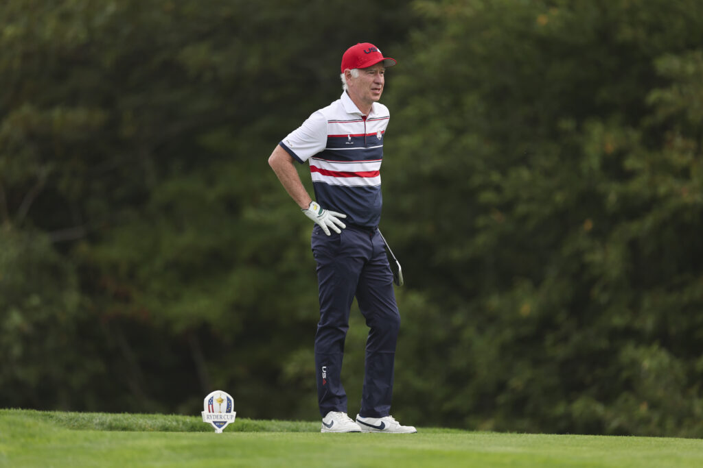 John McEnroe reacts on the third hole during the All-Star Match.