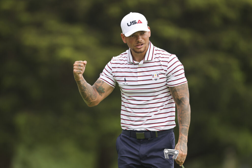 Kane Brown reacts to his putt on the 13th hole.