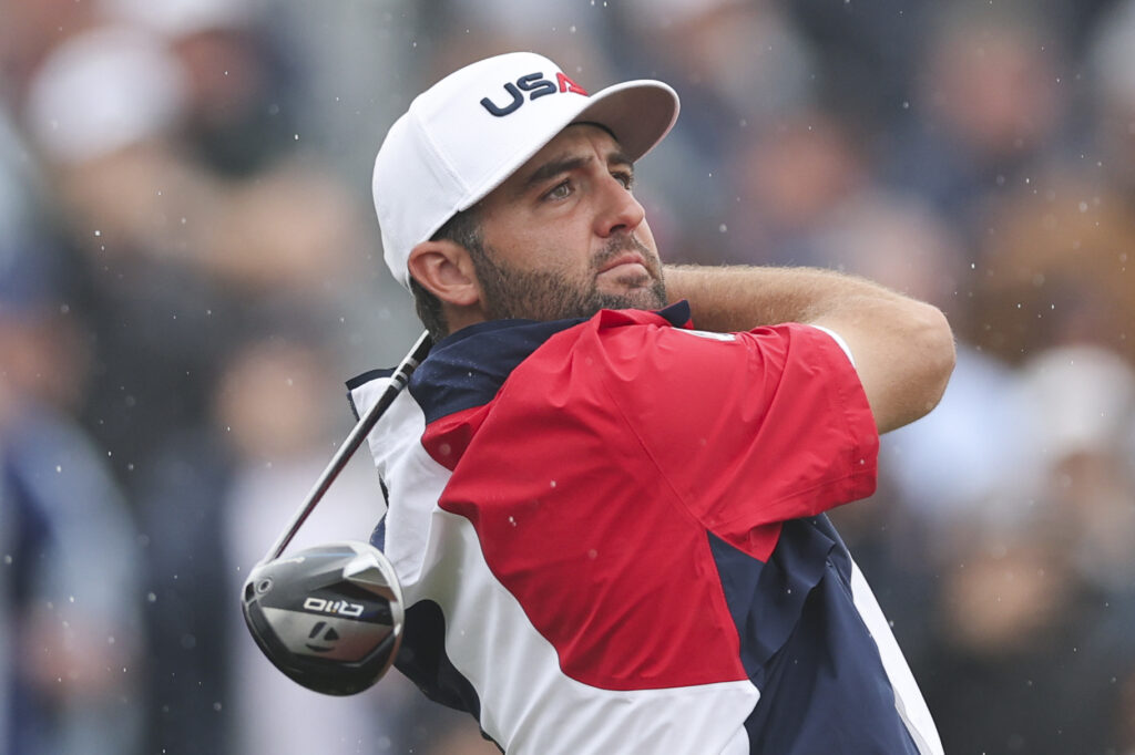 Scottie Scheffler of Team United States hits his tee shot on the first hole during the 2025 Ryder Cup Practice Round. 