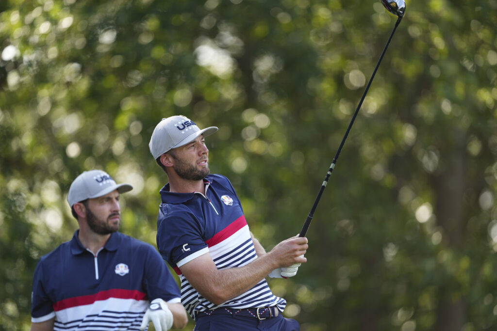 Sam Burns of Team United States watches his tee shot on the seventh hole during the 2025 Ryder Cup.