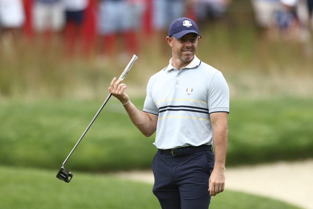 Rory McIlroy of Team Europe spins his putter on the seventh hole during the 2025 Ryder Cup.