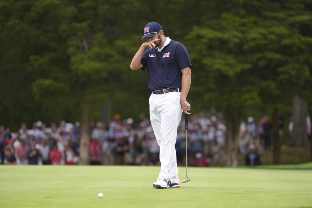 Patrick Cantlay of Team United States reacts to missing his putt on the 13th hole.