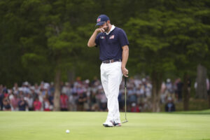 Patrick Cantlay of Team United States reacts to missing his putt on the 13th hole.