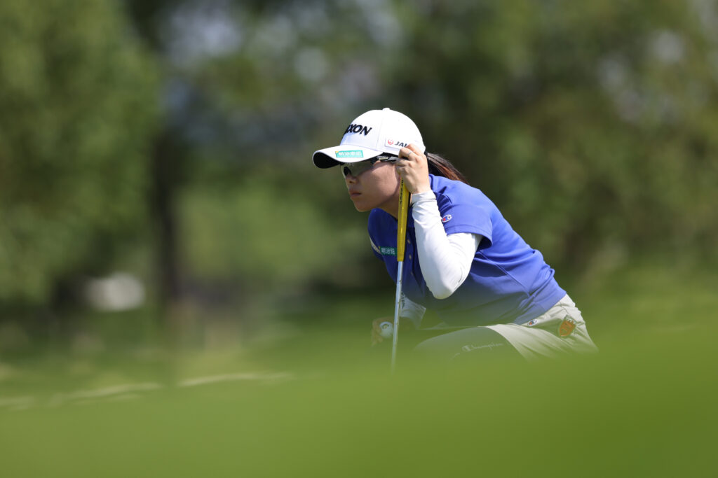 Minami Katsu of Japan lines up a putt on the second green during the third round of the 2025 Buick LPGA Shanghai.