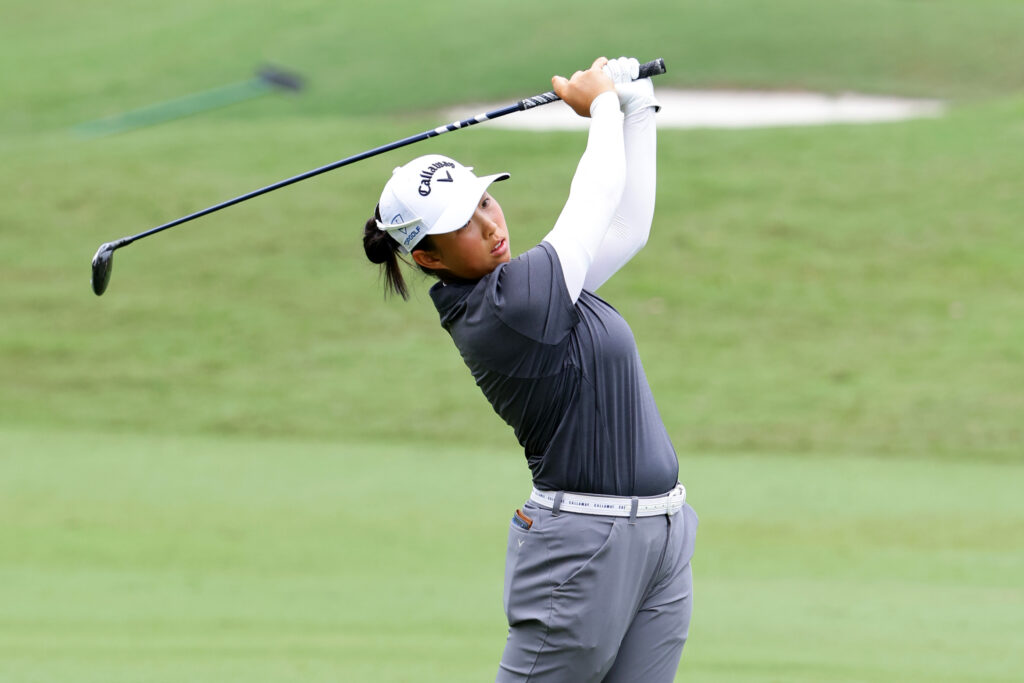 Ruoning Yin of China hits her second shot on the 18th hole of the 2024 Maybank Championship.