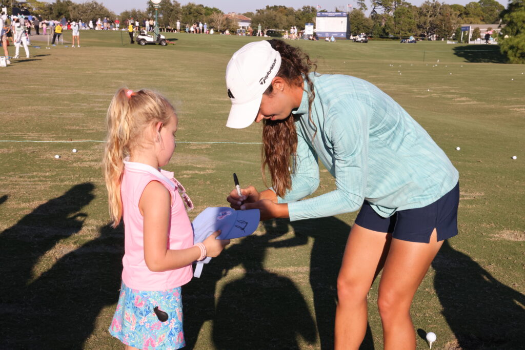 LPGA Tour rookie Julia Lopez Ramirez signed autographs after helping out at Annika's show.