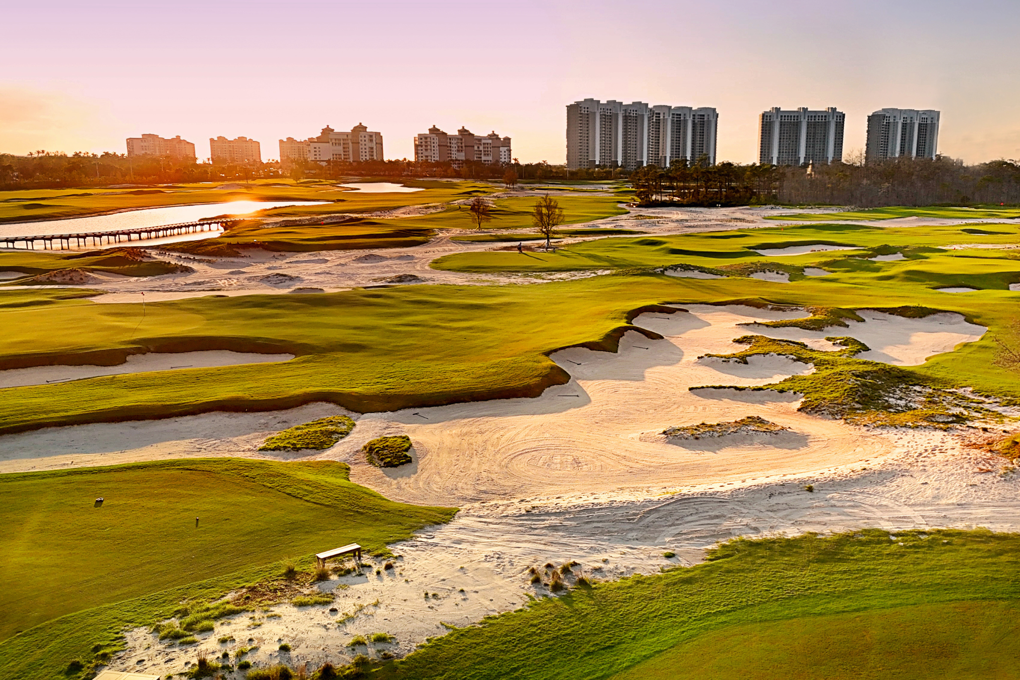 The sun sets over Hole 13 at Kinsale Golf Club in Naples, Florida.