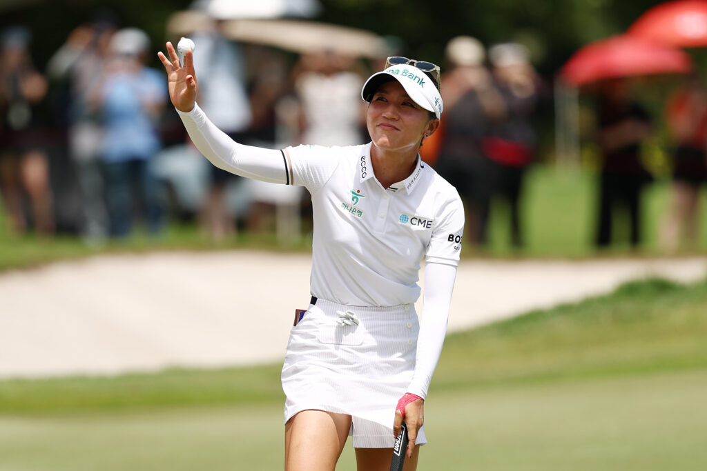 Lydia Ko acknowledges the crowd following victory on the 18th green at the 2026 HSBC Women's World Championship.