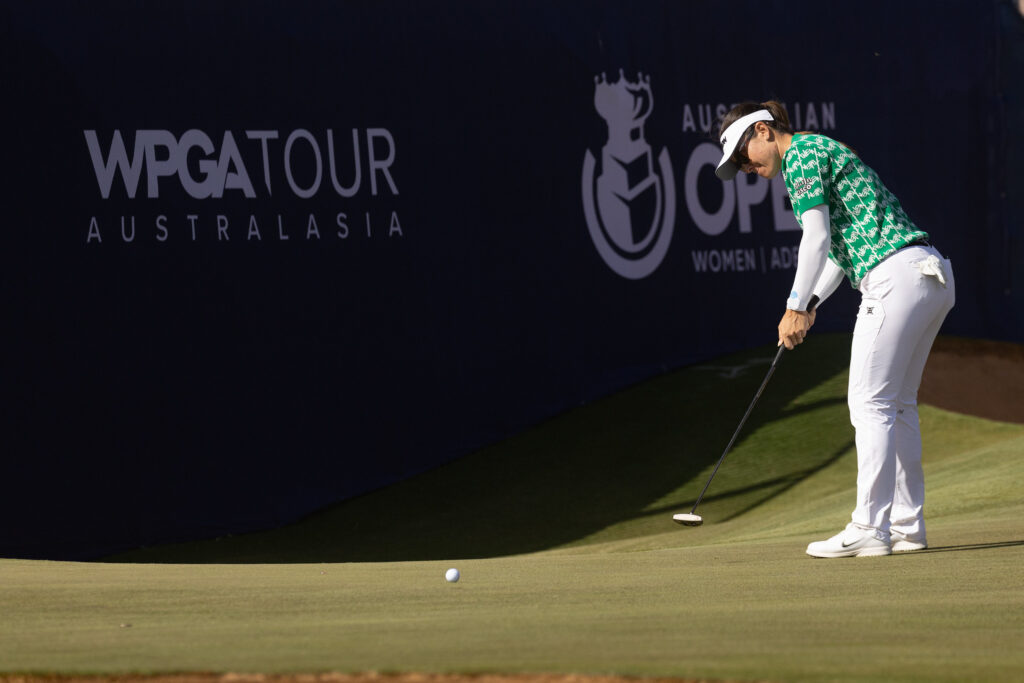 Hannah Green putting on the 18th green during the final round.