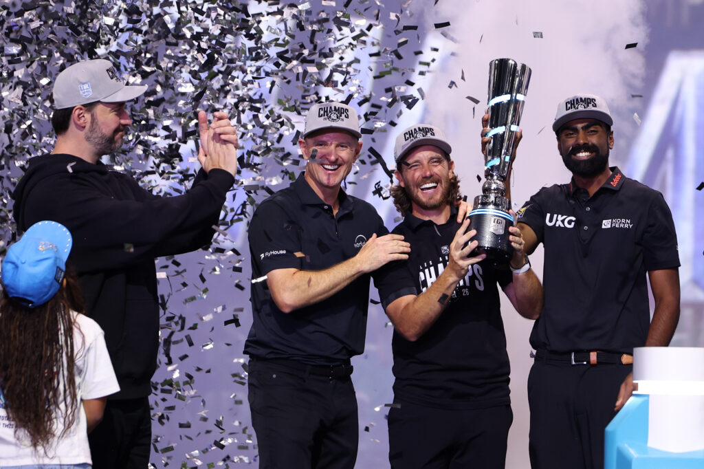Justin Rose, Tommy Fleetwood and Sahith Theegala of the Los Angeles Golf Club celebrate with the winner's trophy after defeating the Jupiter Links Golf Club at SoFi Center.