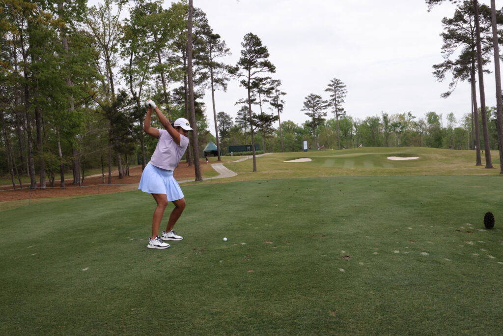 Megha Ganne of Stanford tees off the 11th hole at Champions Retreat Golf Club during the 2026 Augusta National Women's Amateur (ANWA) practice round.