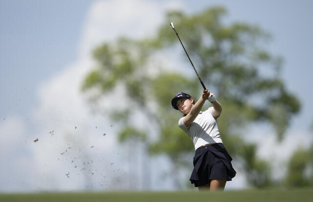 Current co-leader Soomin Oh of South Korea hits her approach shot on hole 16 at Champions Retreat.