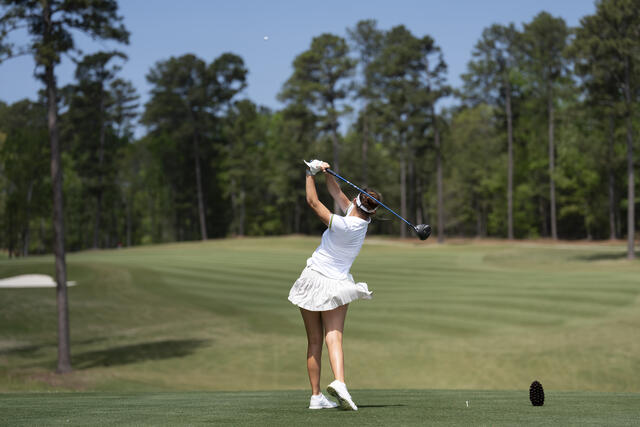 Asterisk Talley tees off hole 12 in the second round.