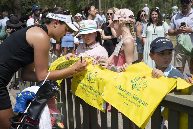 Kiara Romero signs autographs for the girls who will likely try to follow in her footsteps in a few years.