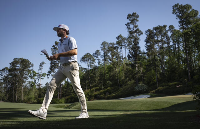 on a mission walking off the 13th green during the third round of the 2026 Masters.