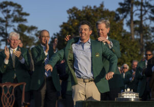 Fred Ridley puts the green jacket on back-to-back winner Rory McIlroy after the final round of the 2026 Masters.