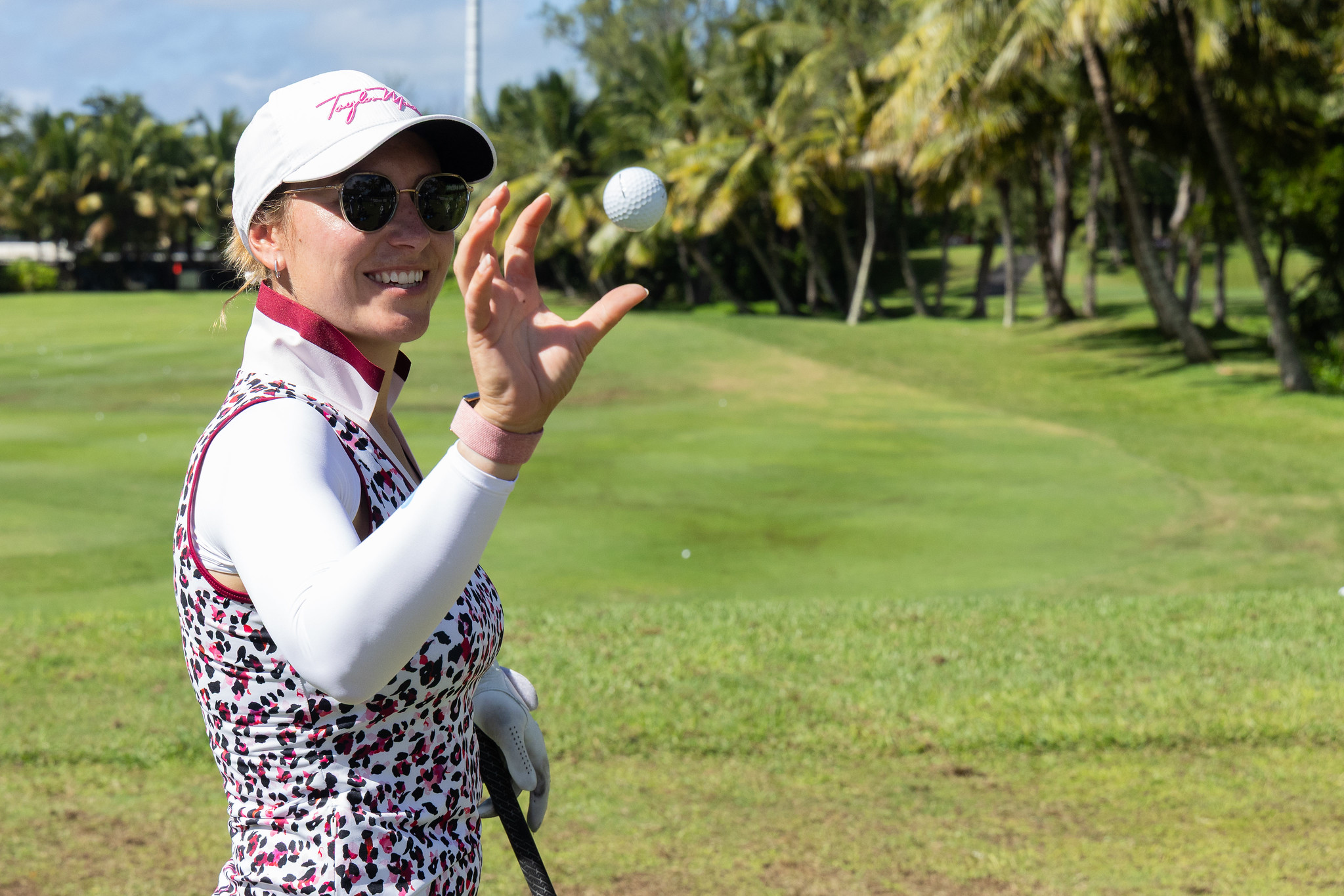 Austria's Katharina Muehlbauer catches a golf ball during the pro-am for the 2026 MCB Classic - Mauritius.