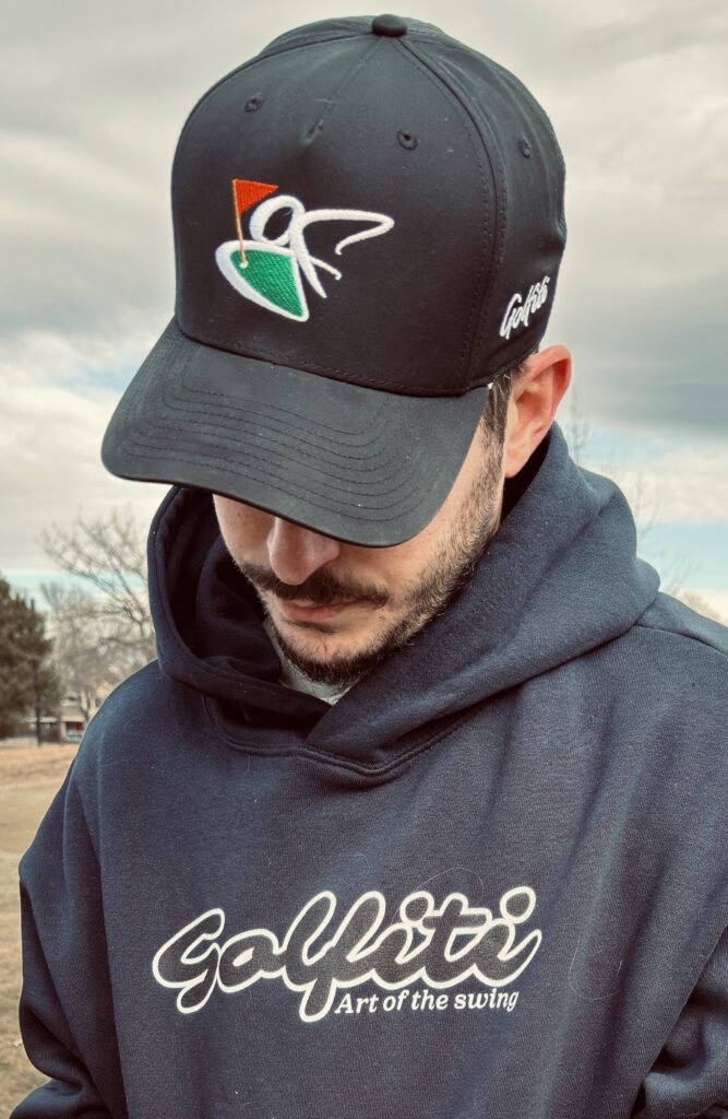 Max posing with one of his Golfiti hats. 