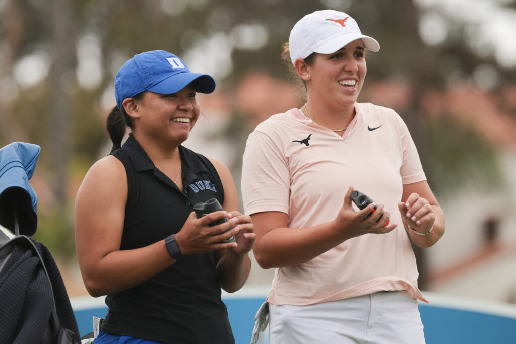 Duke's Rianne Malixi and Texas' Farah O'Keefe laugh as they shoot distances.