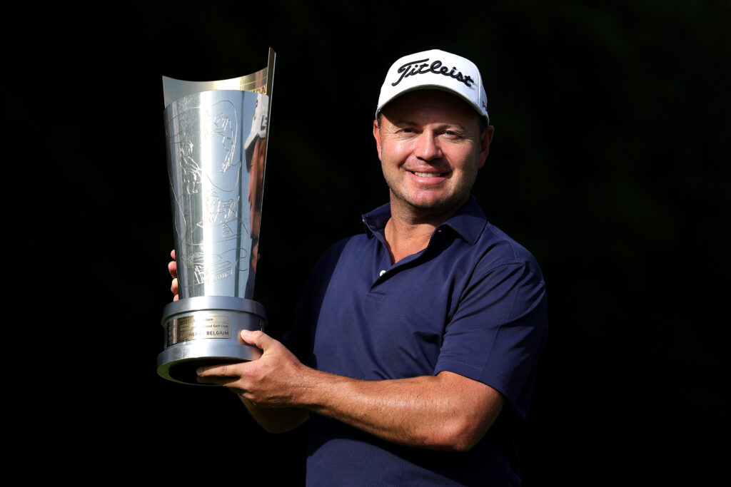 Richard Sterne hoists the 2026 Soudal Open trophy.