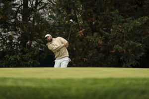 Scottie Scheffler hits his shot on the 12th hole during the 2026 PGA Championship Practice Round.
