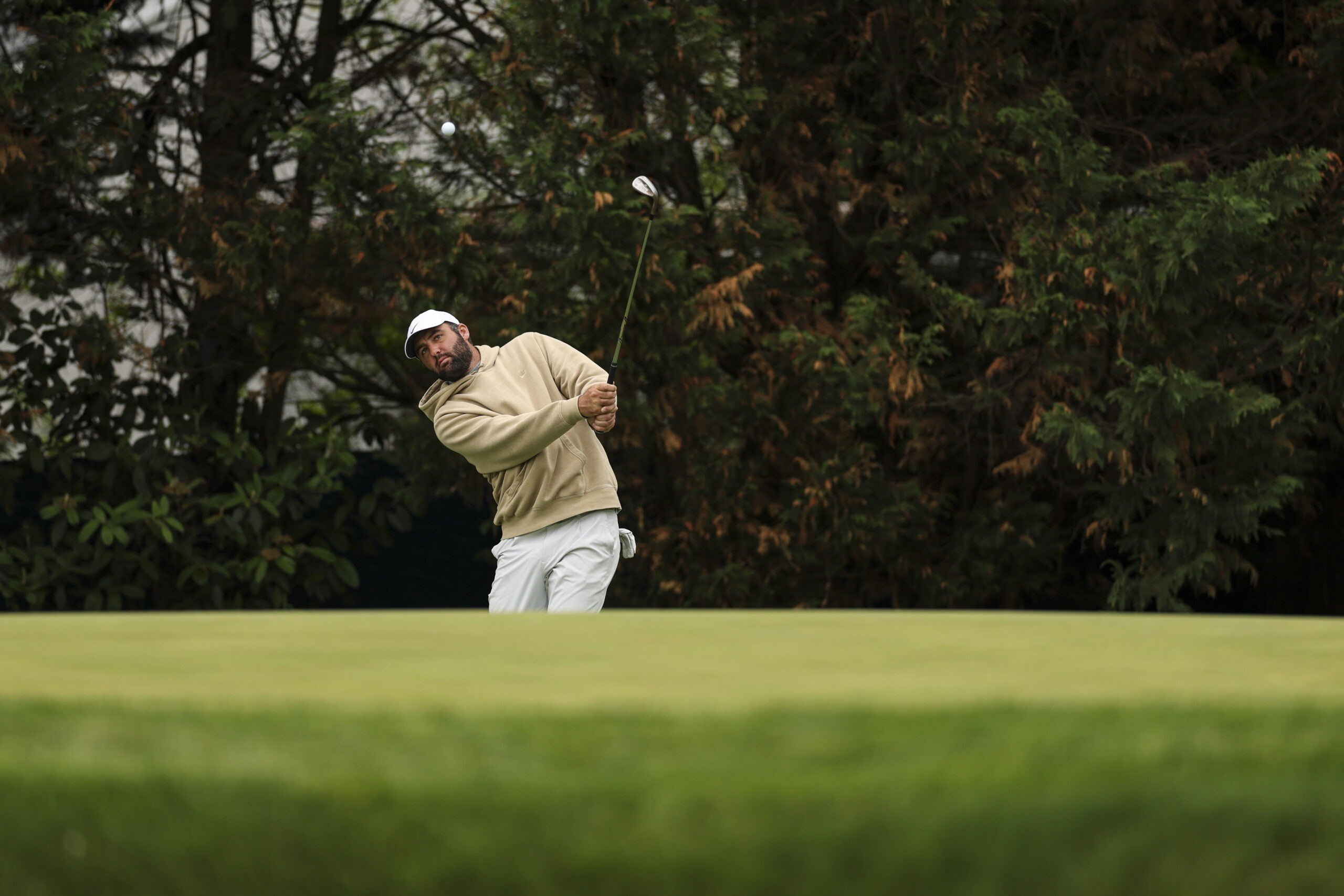 Scottie Scheffler hits his shot on the 12th hole during the 2026 PGA Championship Practice Round.