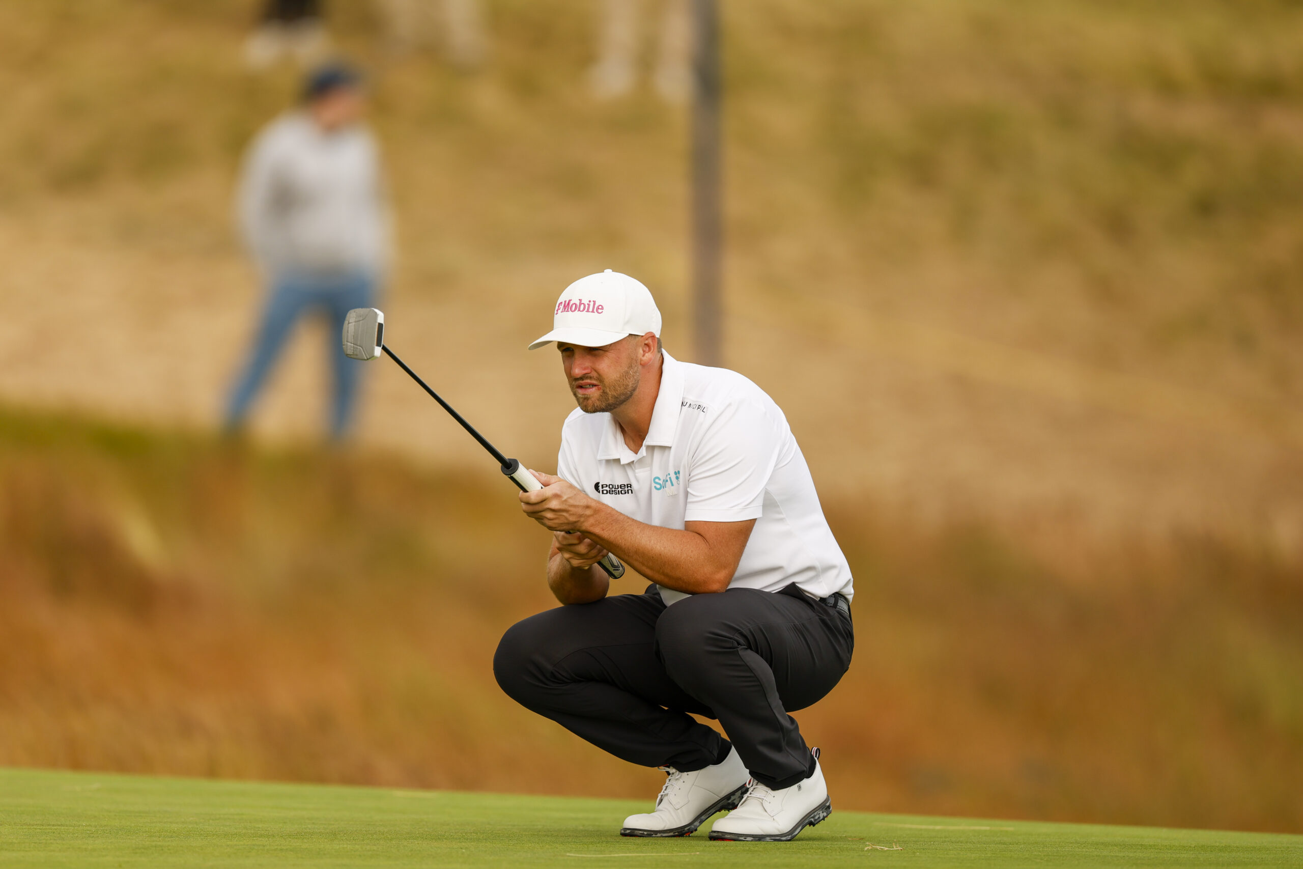 Wyndham Clark lines up his putt on the ninth hole during the first round of the 2026 U.S. Open at Shinnecock Hills.