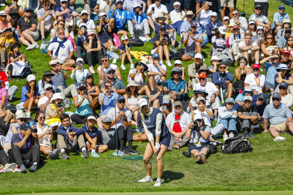 Charley Hull chips a shot onto the 18th hole green during the final round of the 2026 U.S. Women's Open Presented by Ally.