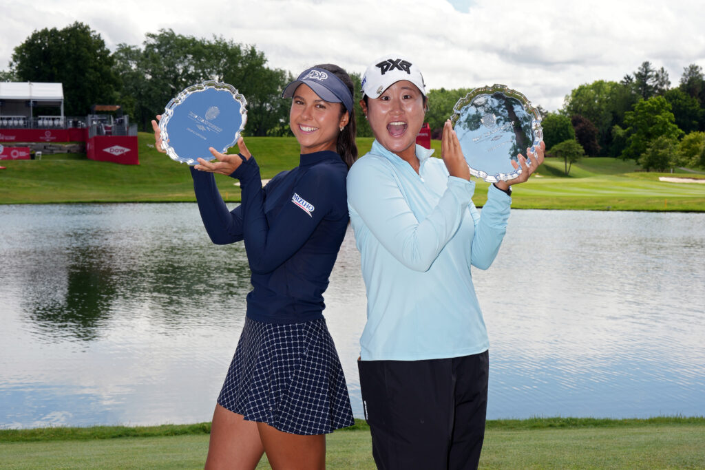 Yana Wilson and Gina Kim pose with the trophy after winning the 2026 Dow Championship.
