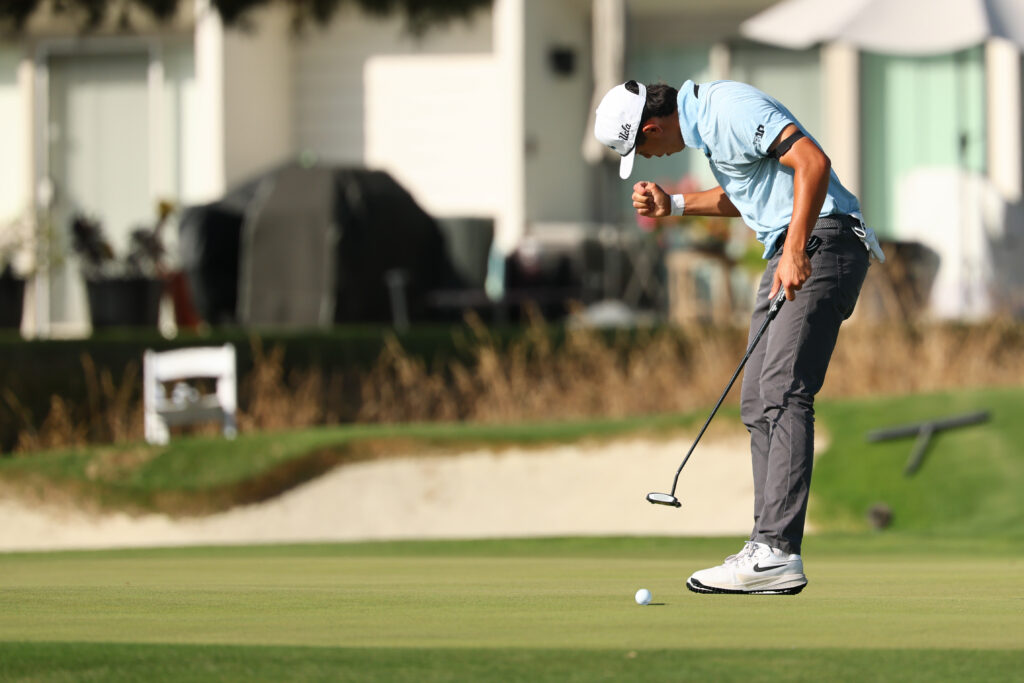 Tyler Loree of the UCLA Bruins celebrates after making a putt against Tianyi Xiong of the Arizona Wildcats on the sixteenth green during the 2026 NCAA Division I Men’s Golf Championship. 